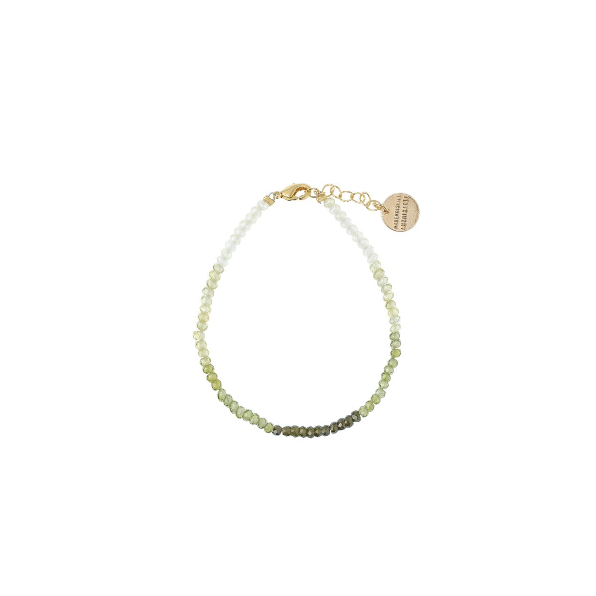 Bracelet fin Mademoiselle Antoinette en perles de verre facetté avec un dégradé tie and dye allant du blanc au vert kaki foncé.