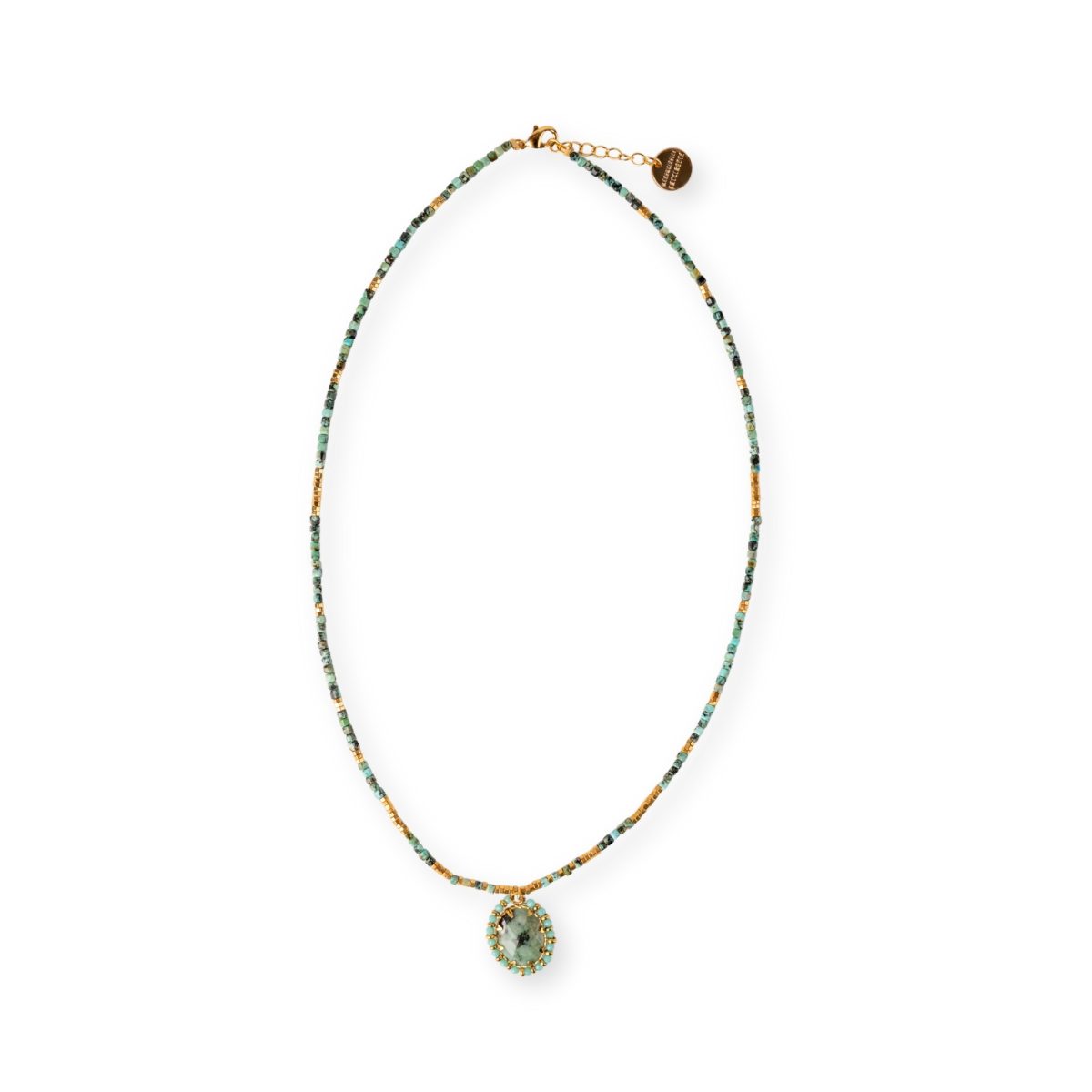 Collier Santa Cruz Mademoiselle Antoinette en perles cubes de turquoise et hématites dorées avec pendentif ovale en pierre naturelle.